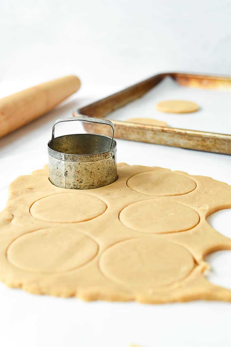 cutting out sugar cookies