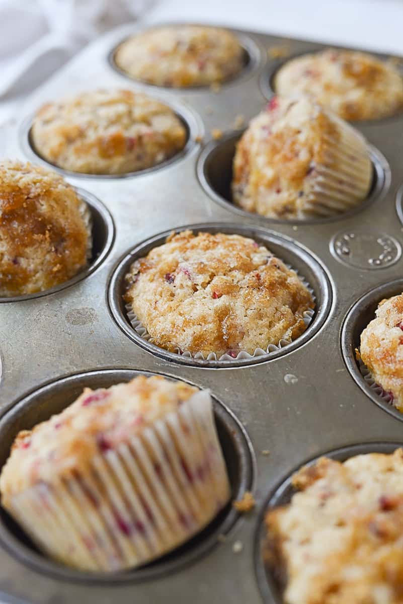 sugar topping on cranberry muffins