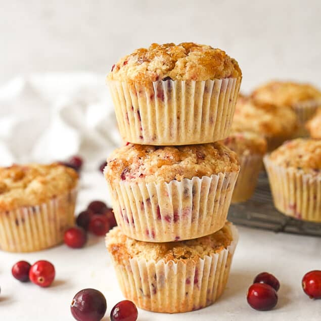 stack of cranberry pineapple muffins