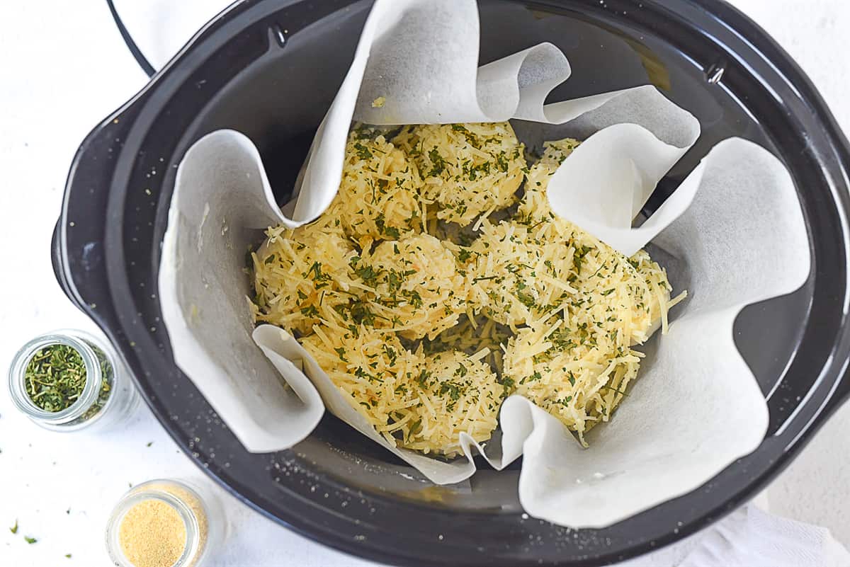 overhead shot of rolls in slow cooker.