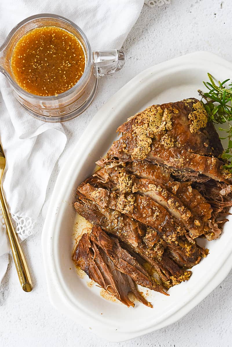 overhead shot of crock pot brisket on a platter