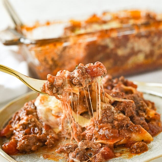 fork full of lasagna