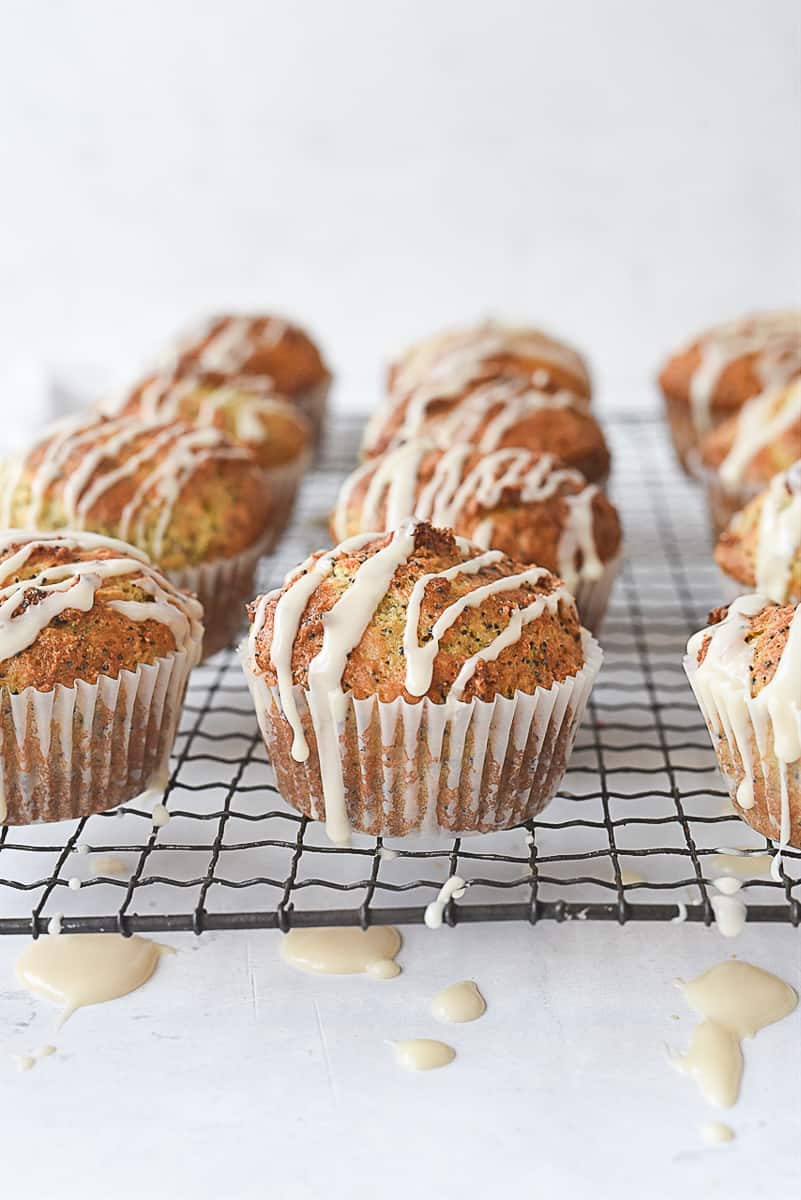 three rows of muffins on a cooling rack