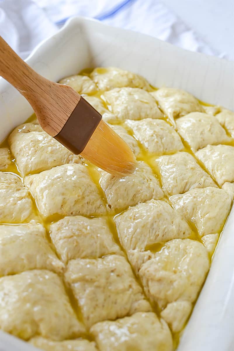 putting butter onto dough