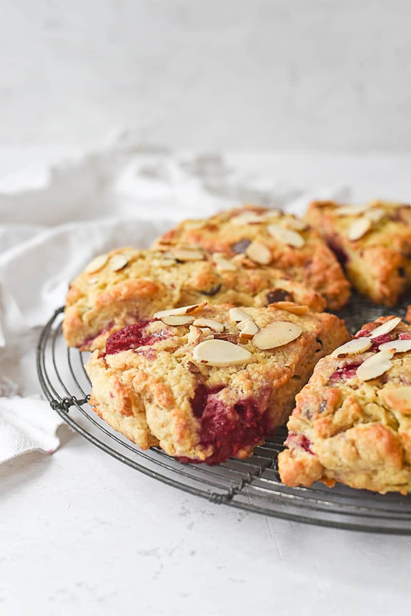 raspberry scones on a cooling rack.
