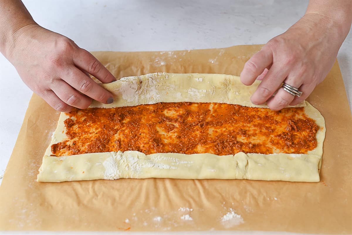 rolling up palmier dough