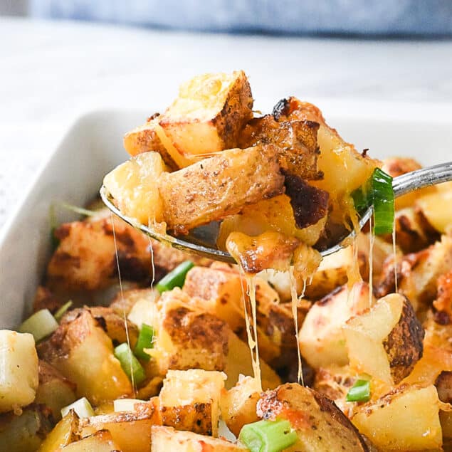 cheesy ranch potatoes on a spoon