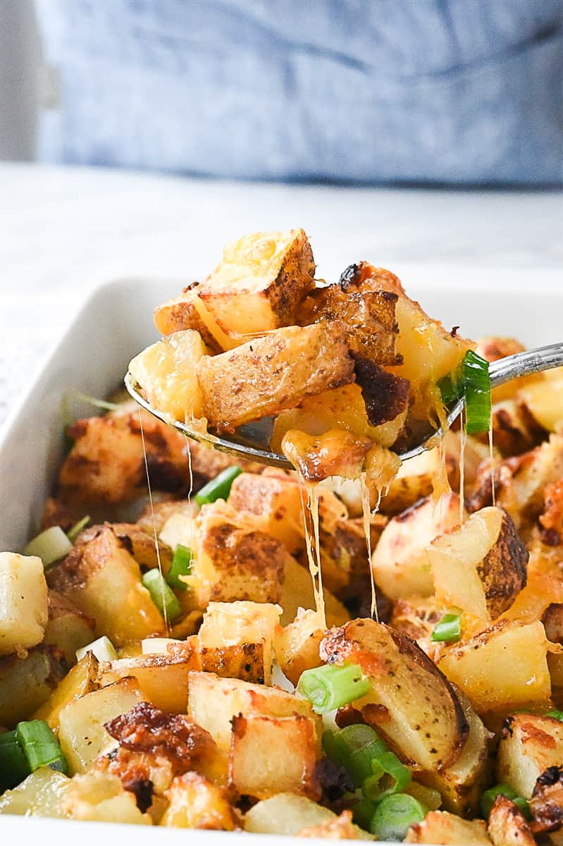 cheesy ranch potatoes on a spoon