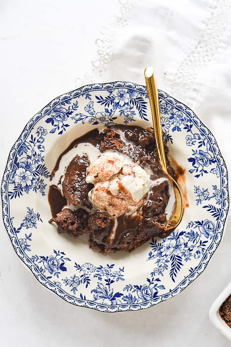 overhead shot of hot fudge sundae cake with ice cream