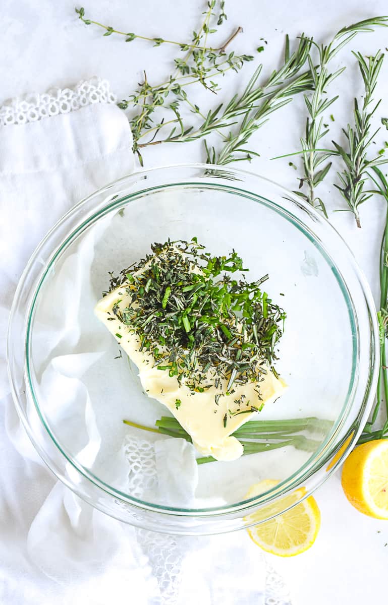 butter and herbs in a bowl