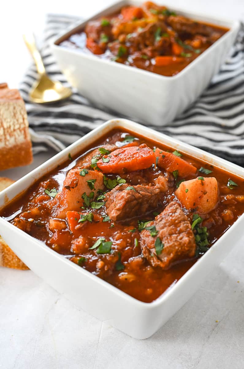 two bowls of beef and barley soup