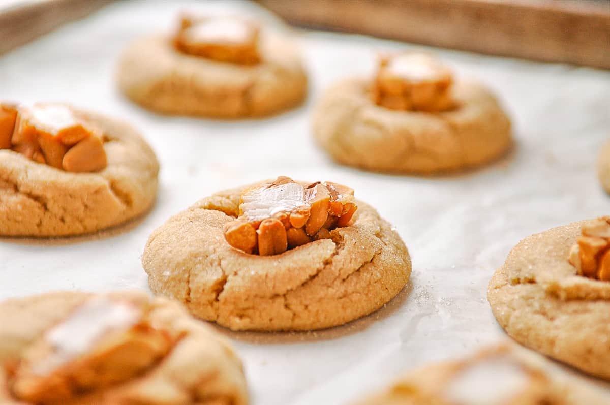 peanut butter blossoms on a baking sheet