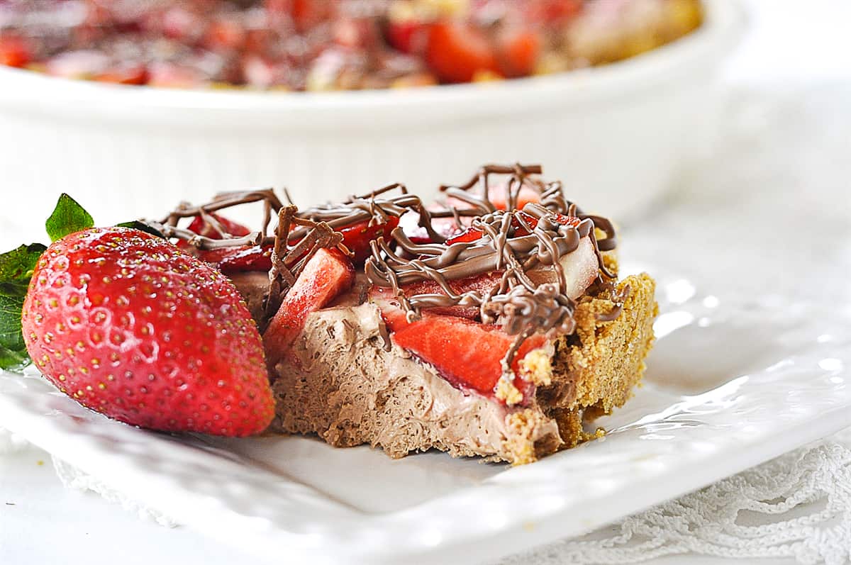 slice of strawberry chocolate pie on a plate