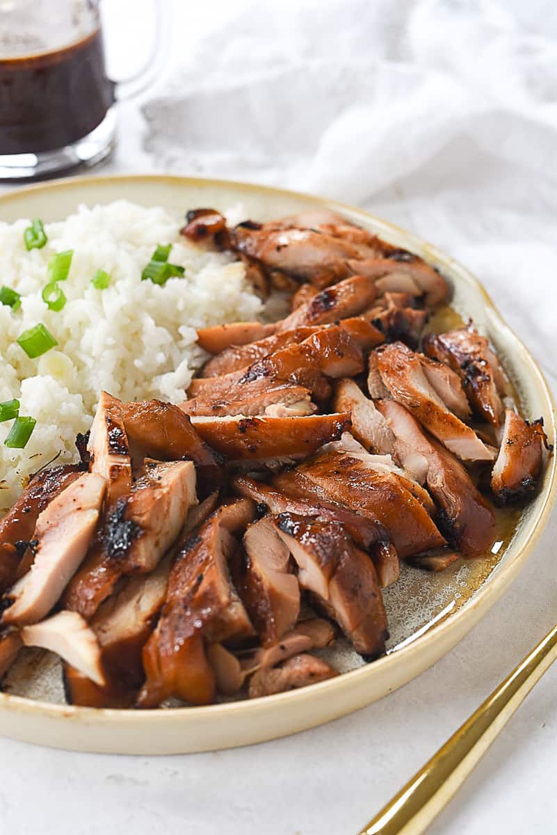 plate of teriyaki chicken and rice