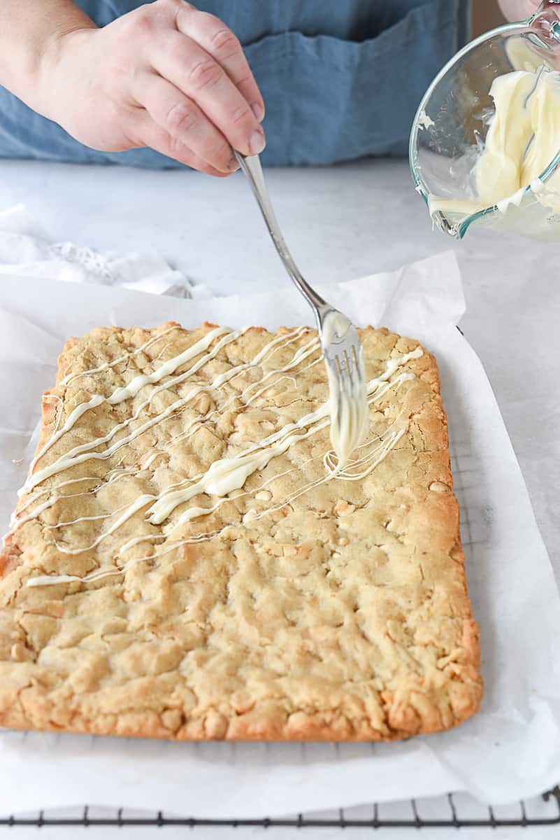 drizzling blondies with white chocolate.