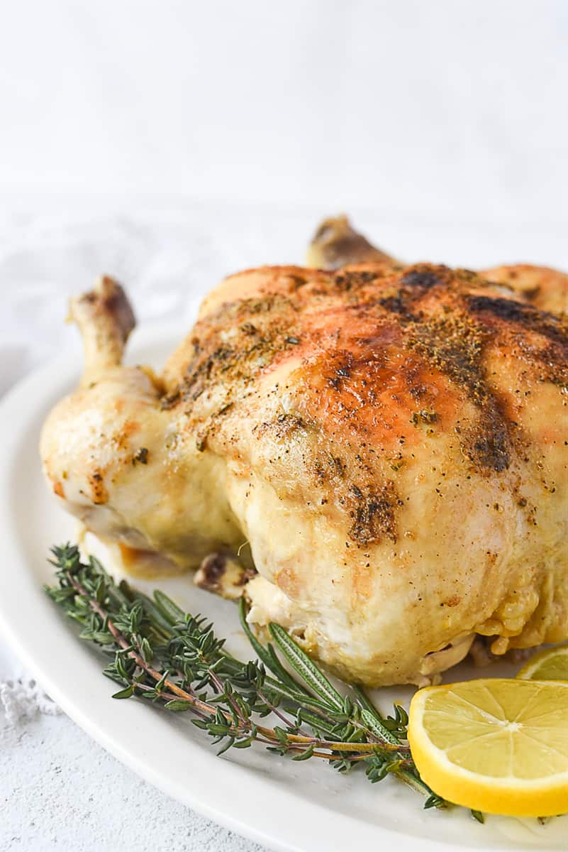 whole instant pot chicken on serving dish