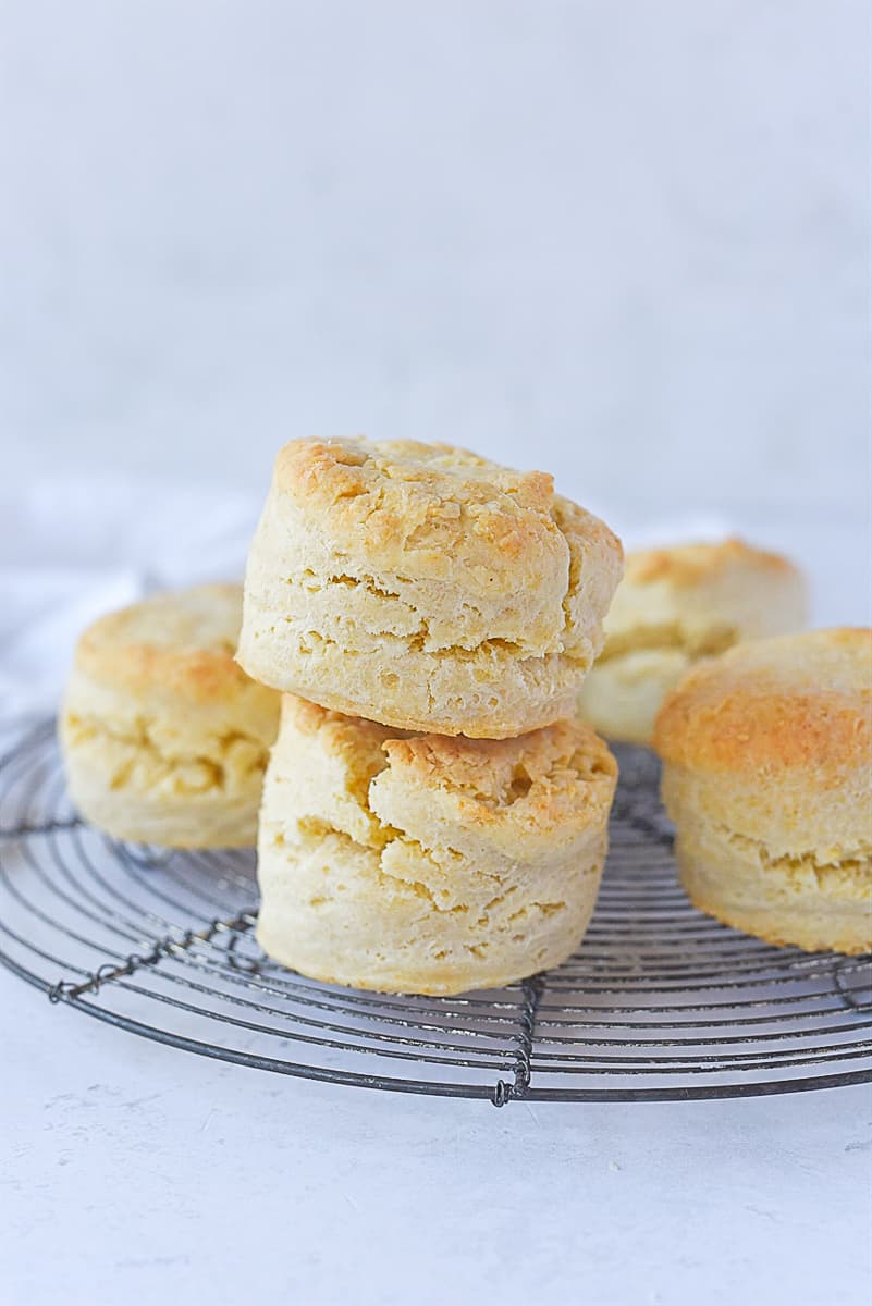 stack of fluffy biscuits on a cooling rack
