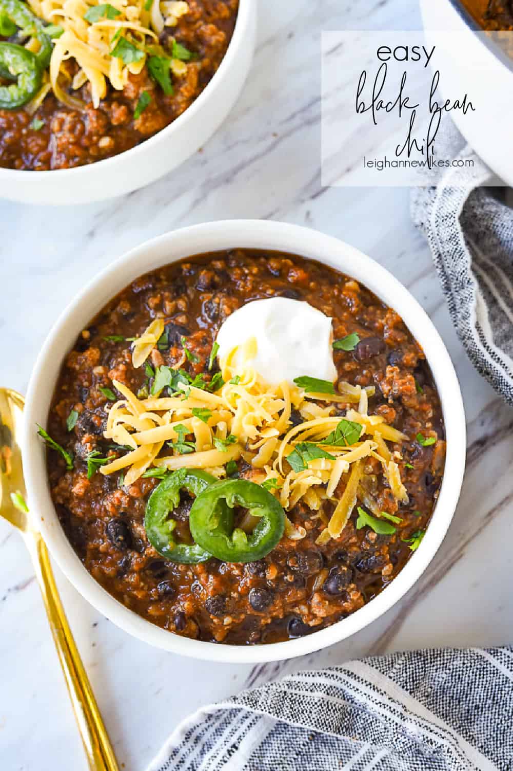 bowl of black bean chili with cheese on top