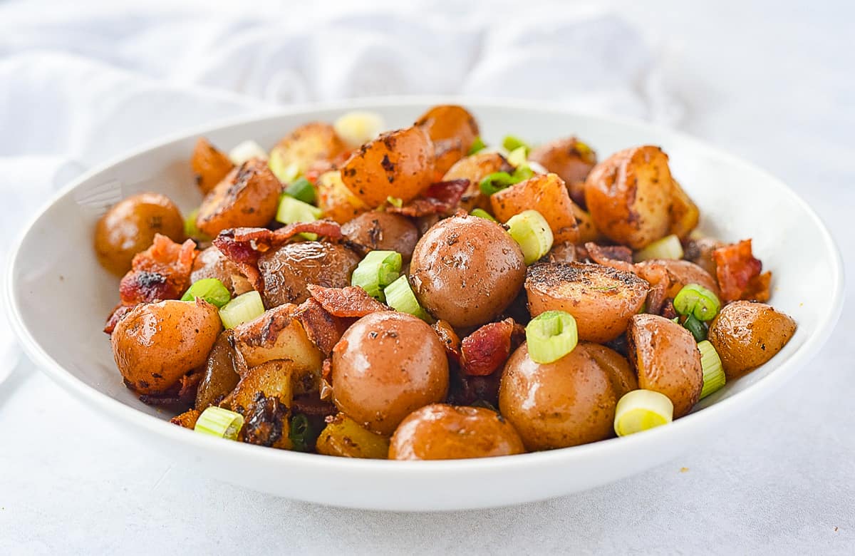 white bowl of breakfast potatoes