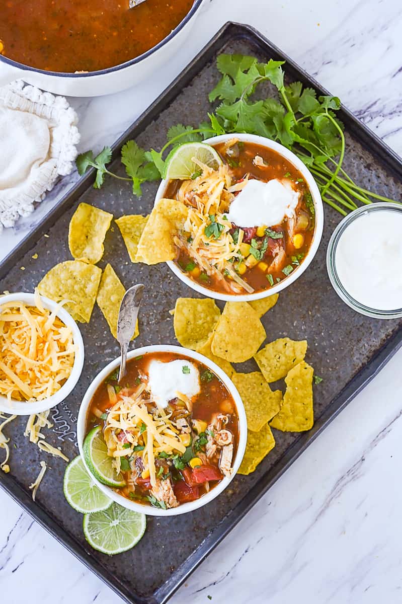 overhead shot of two bowls of chicken tortilla soup