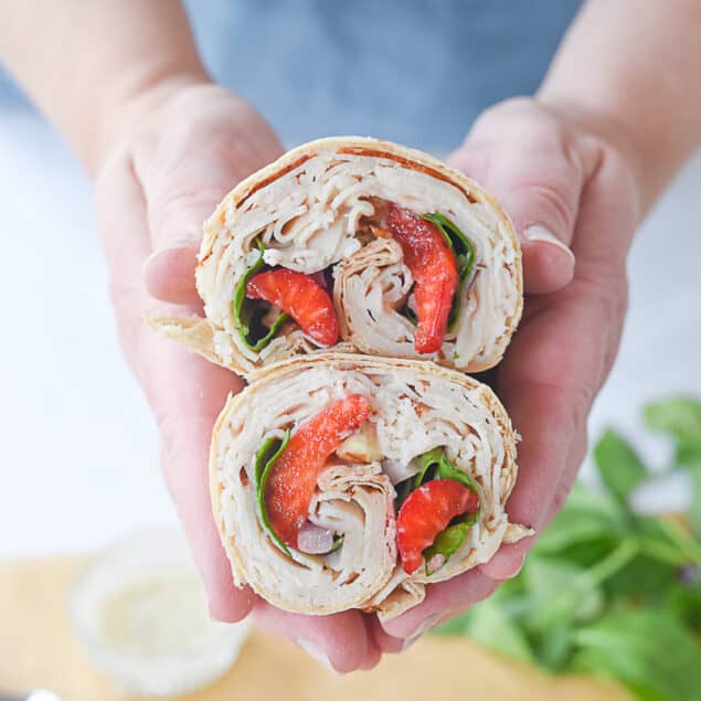 hands holding. turkey wrap