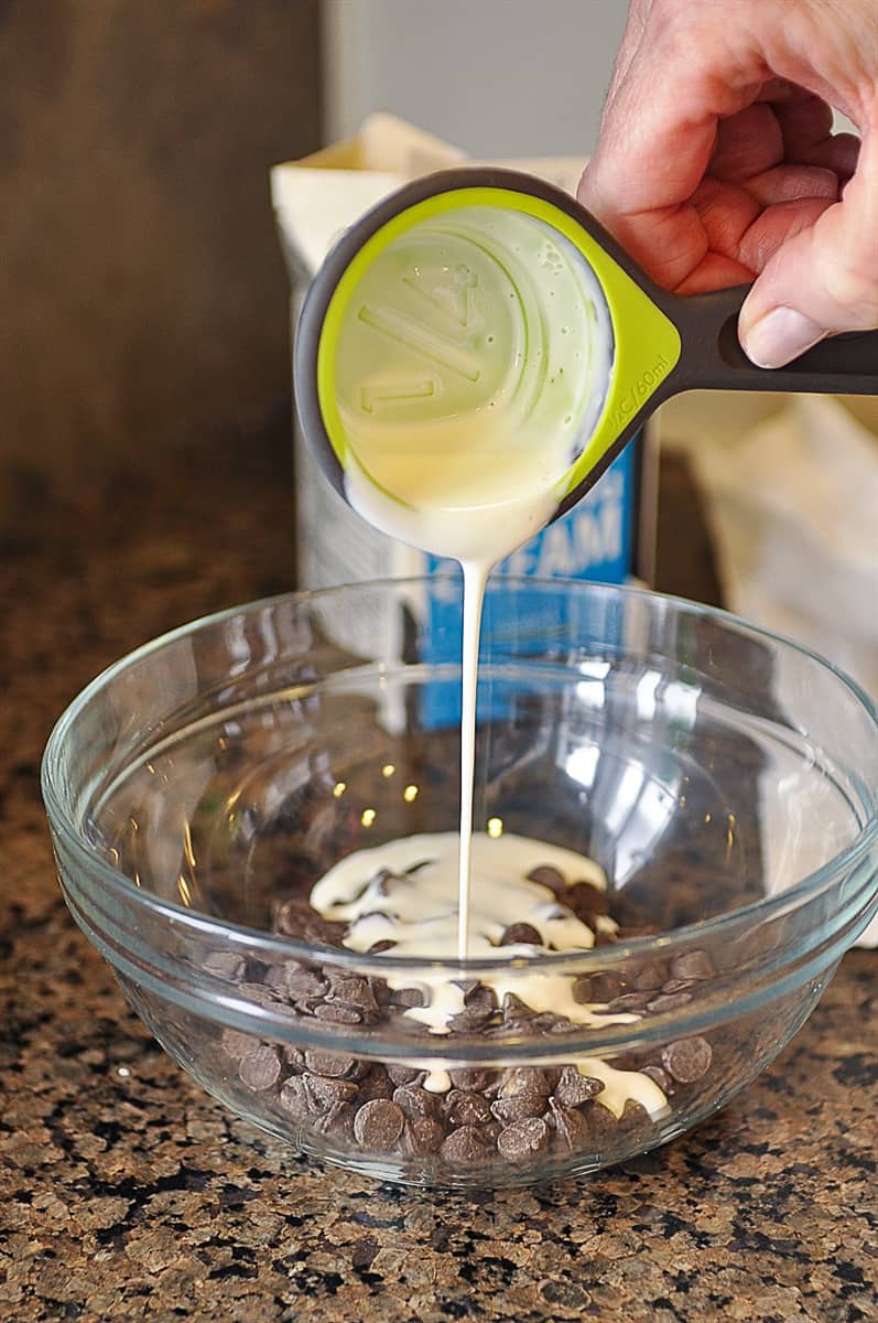 pouring cream over chocolate