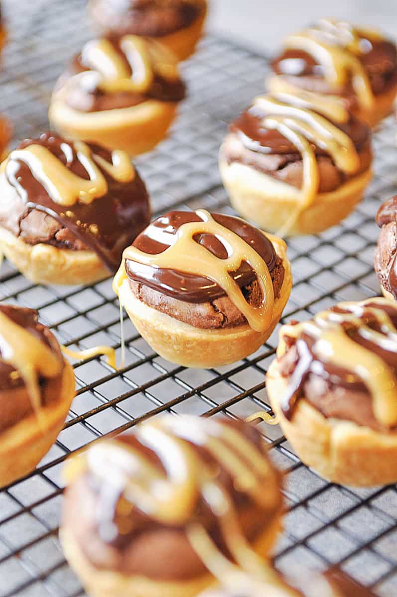 caramel brownie bites on a cooling rack