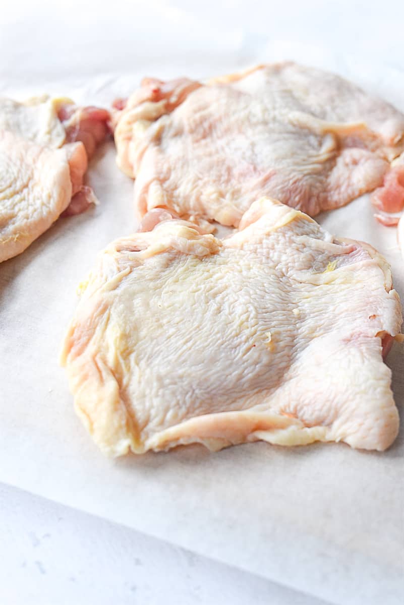 chicken thighs on parchment paper