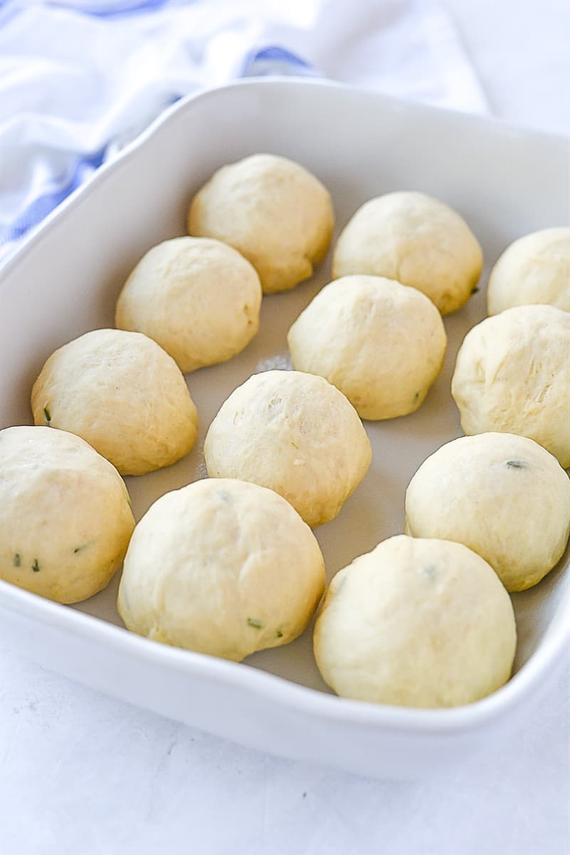 balls of dough in pan