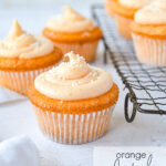 orange creamsicle cupcakes with sprinkles on top