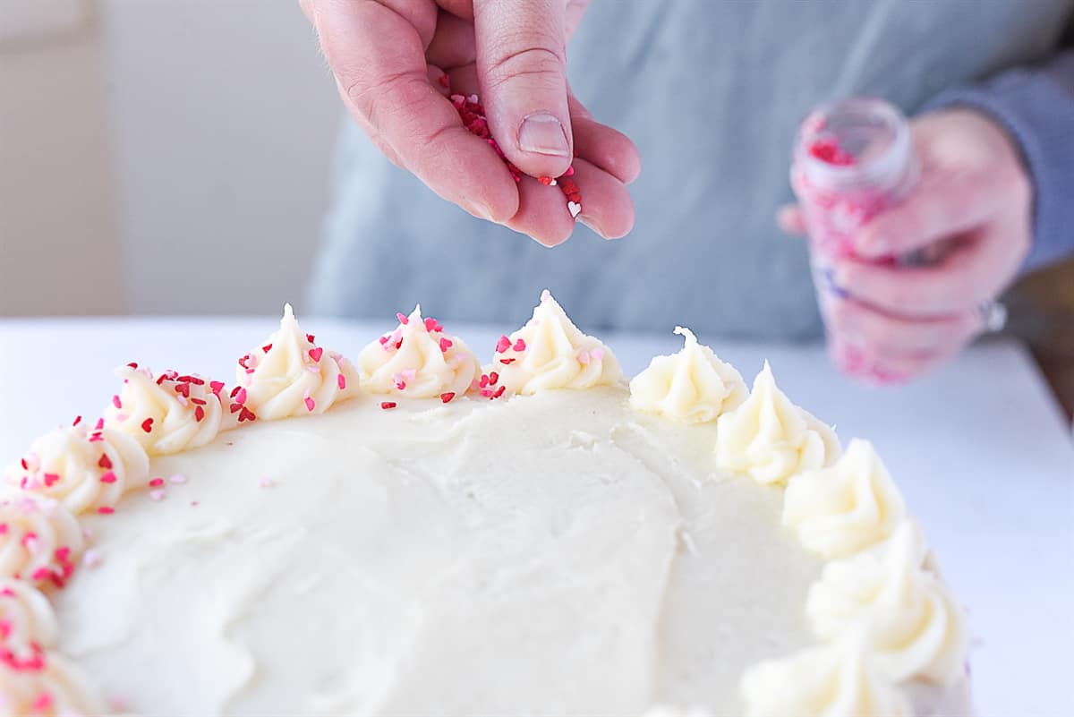 adding sprinkles to red velvet cake