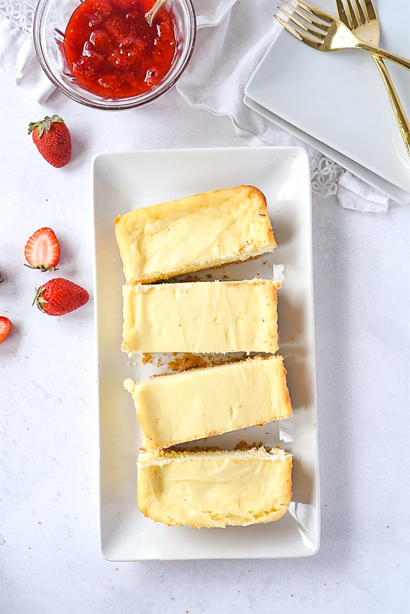 overhead shot of sliced cheesecake for two