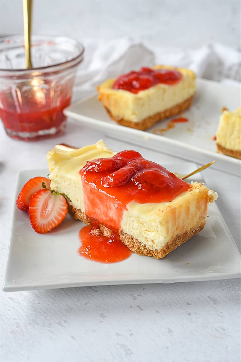 slice of cheesecake with strawberry syrup