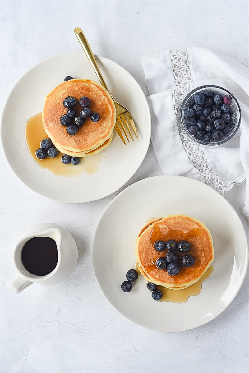 overhead shot of pancakes for two on plates