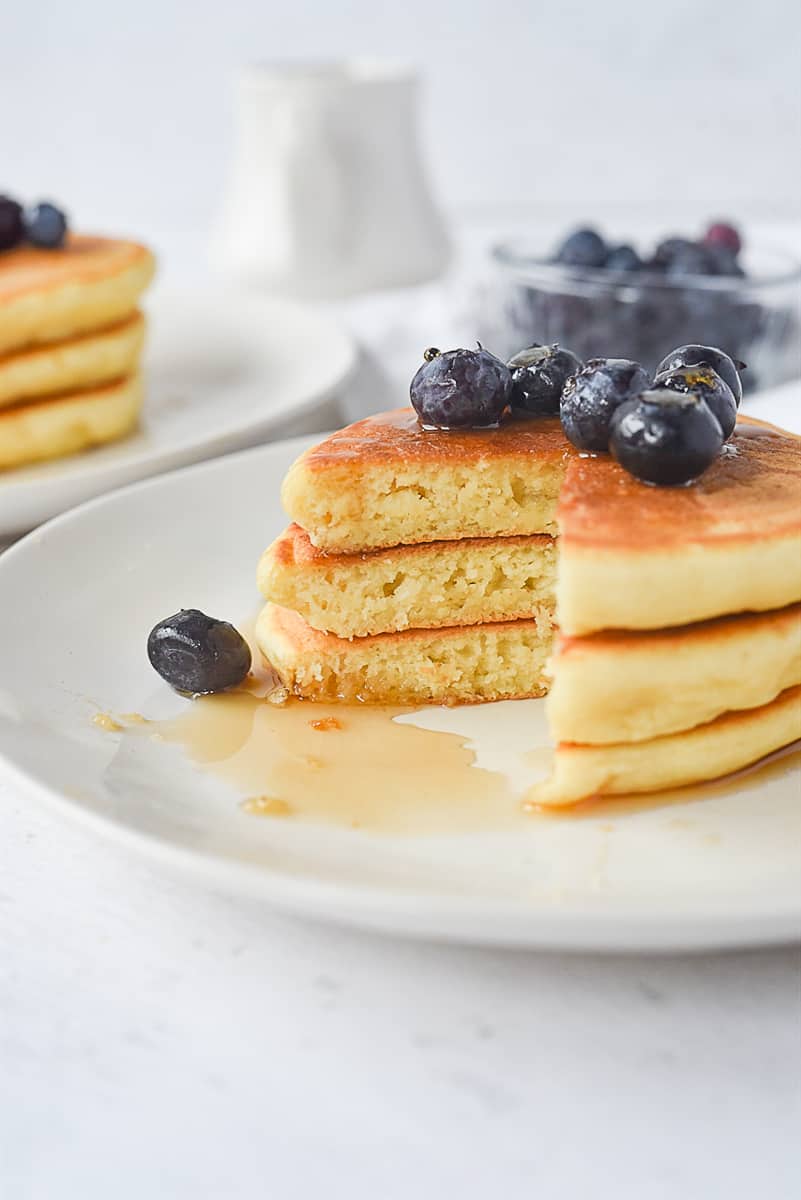 pancakes for two with blueberries on top