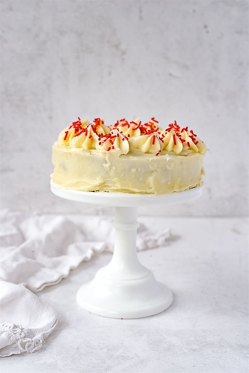 red velvet cake for two on a white cake stand