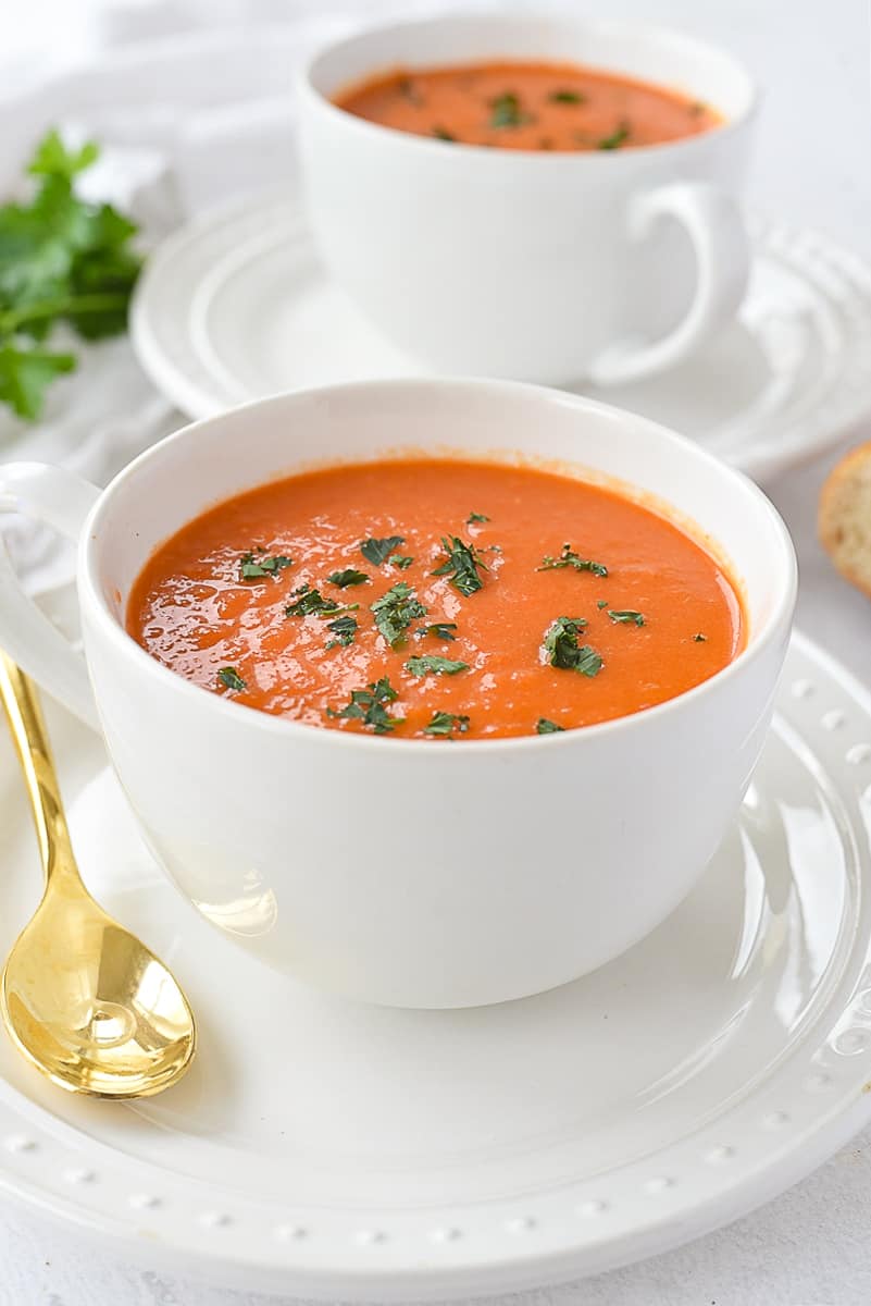 bowls of roasted red pepper and tomato soup