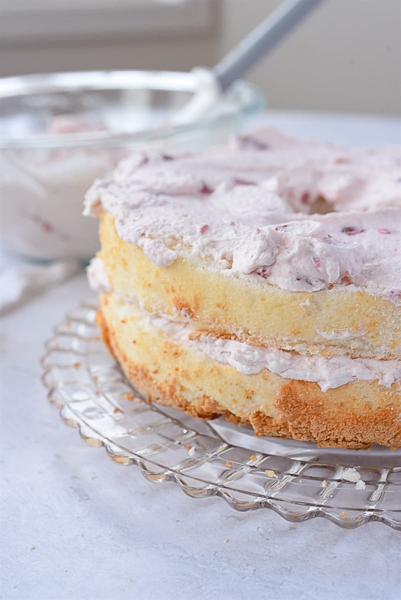 layers of angel food cake with cream filling