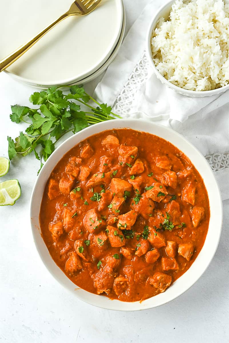 overhead shot of butter chicken in a bowl