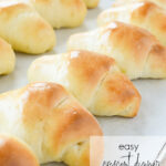 baked crescent rolls on parchment paper