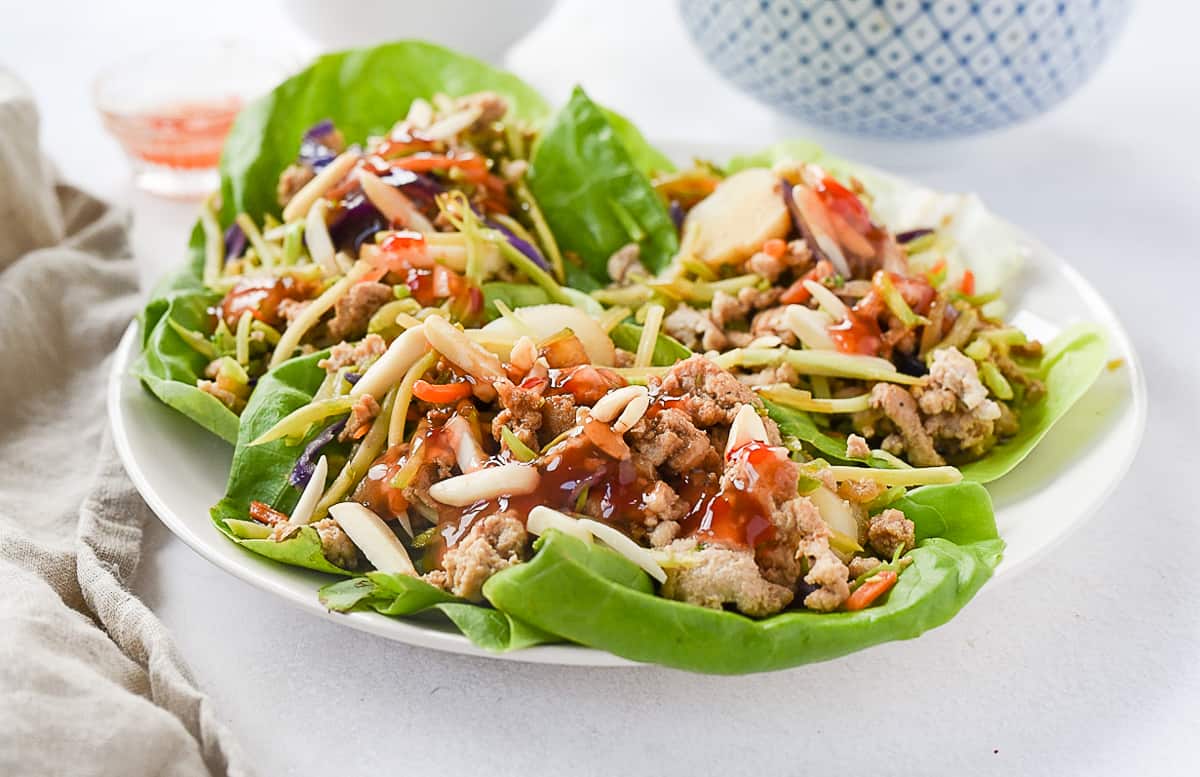 plate with three chicken lettuce wraps