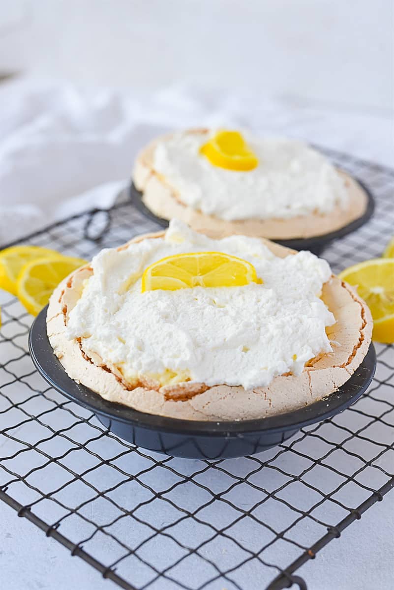 two lemon angel pies on a cooling rack