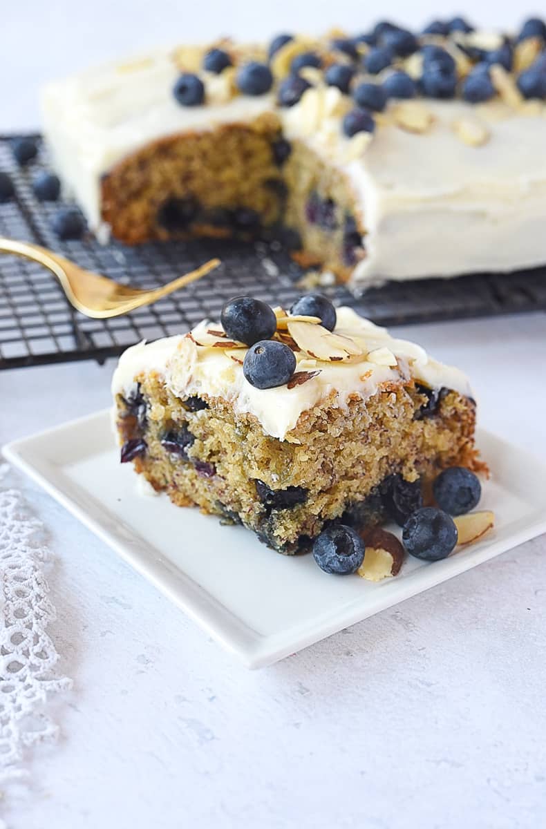 slice of blueberry banana cake on a plate