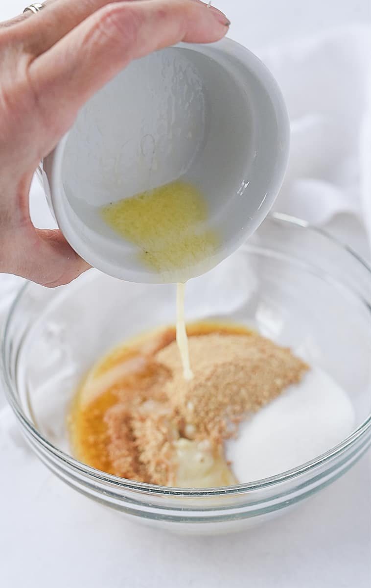 pouring butte rinto graham cracker crust