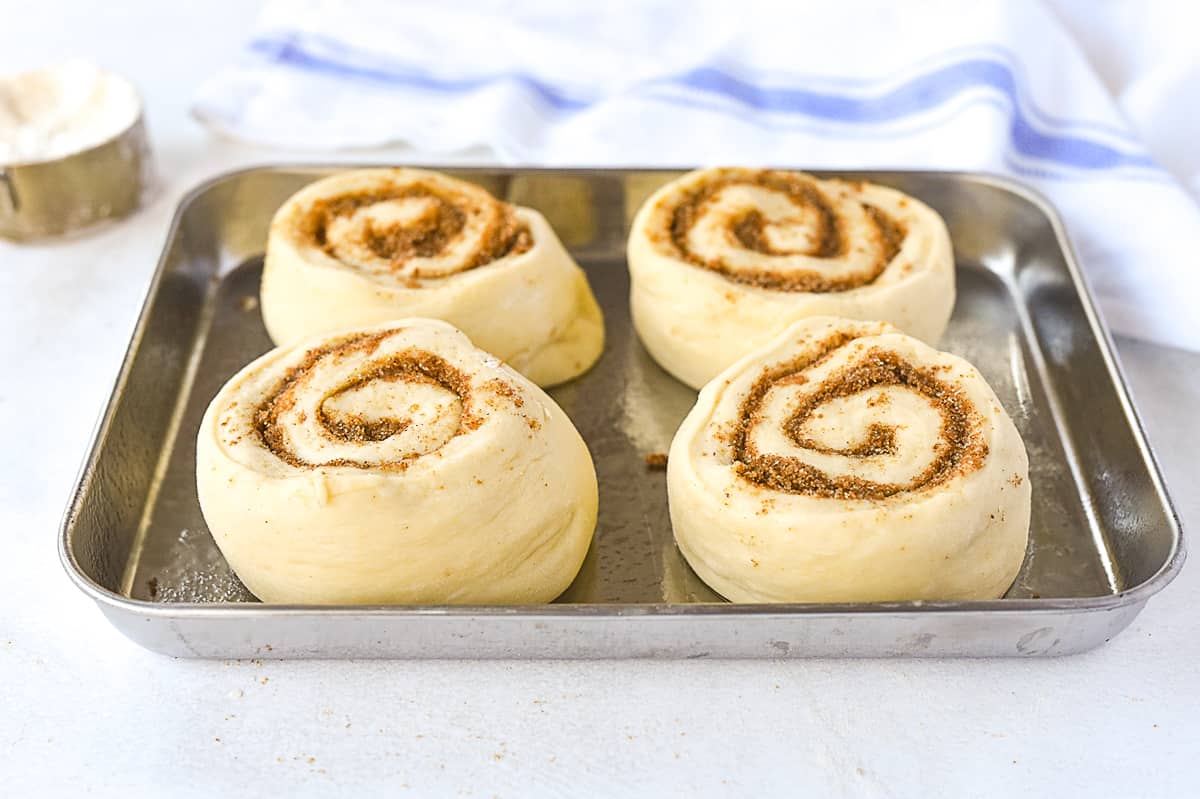 cinnamon roll dough on baking sheet