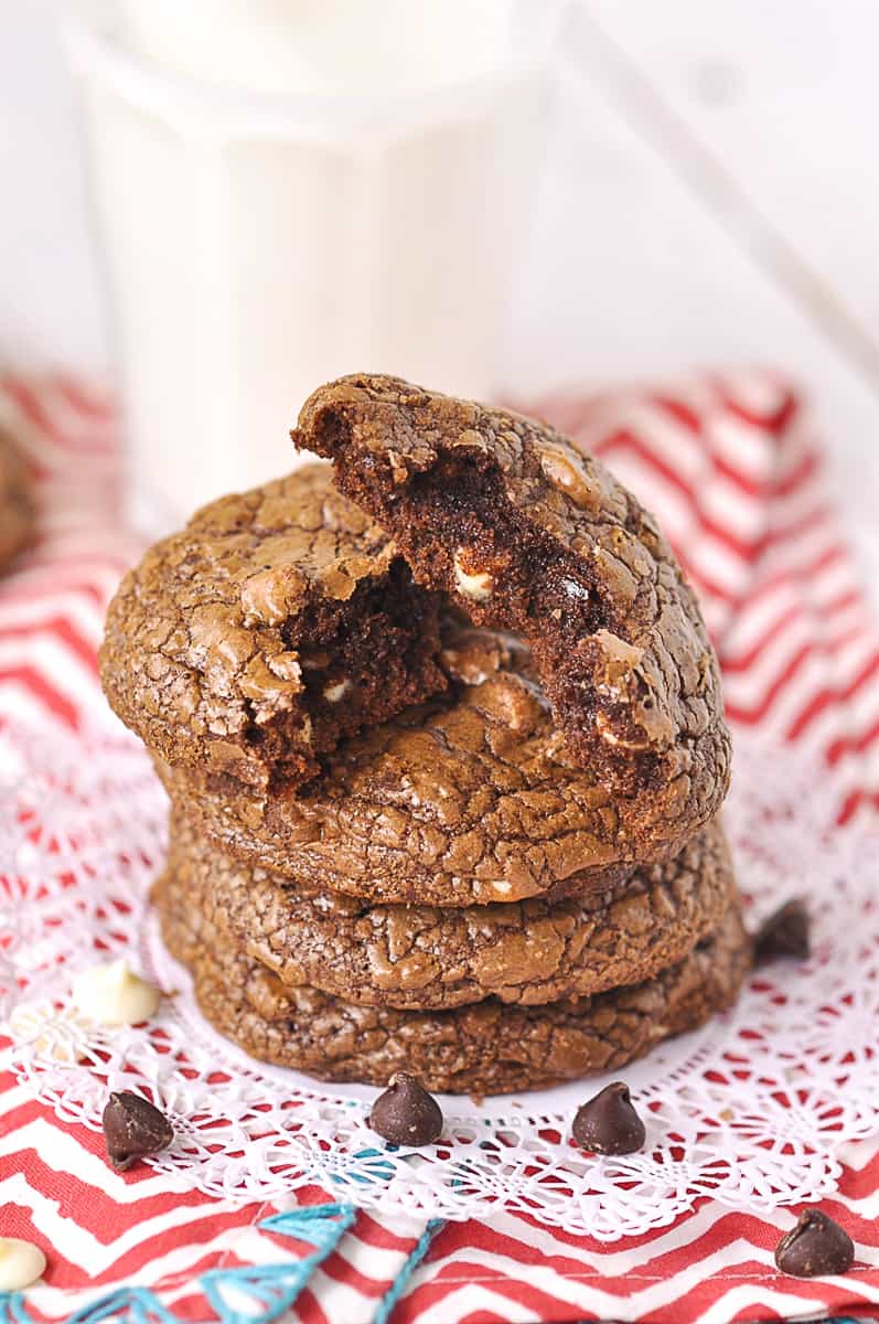 stack of cookies with a glass of milk