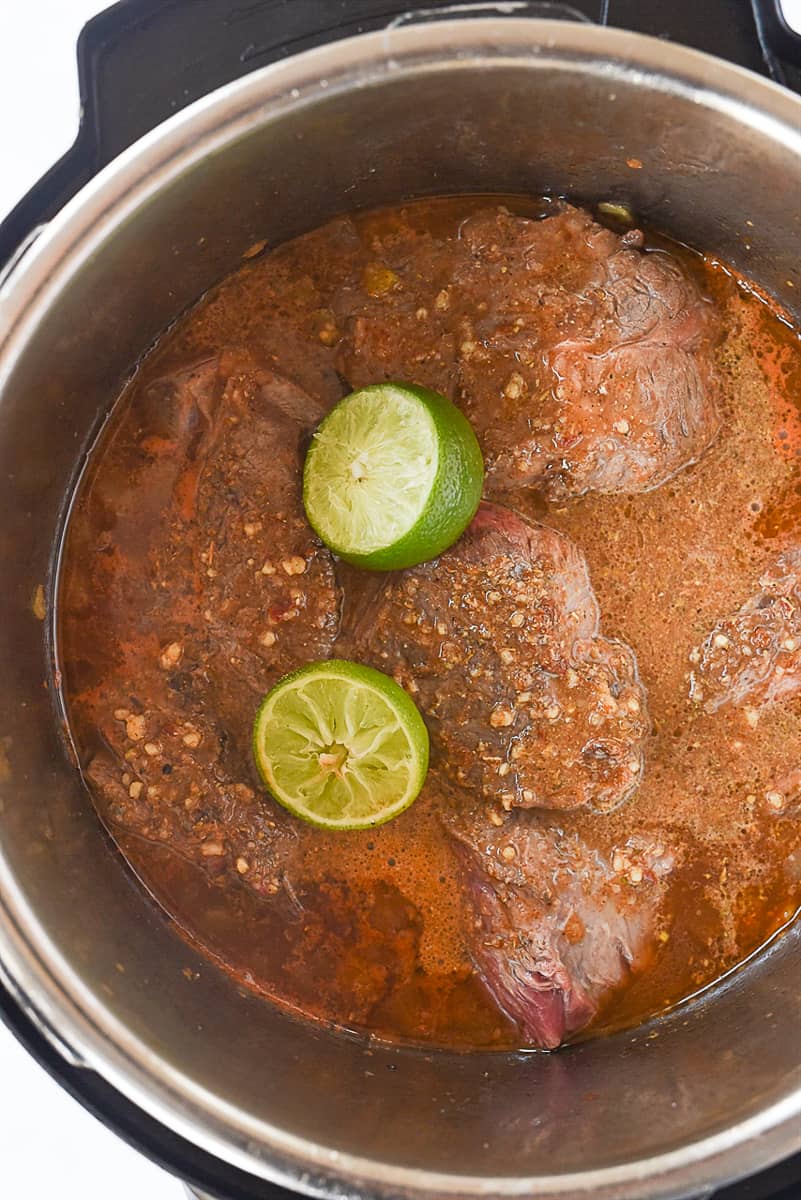 over head shot of beef barbacoa in instant pot