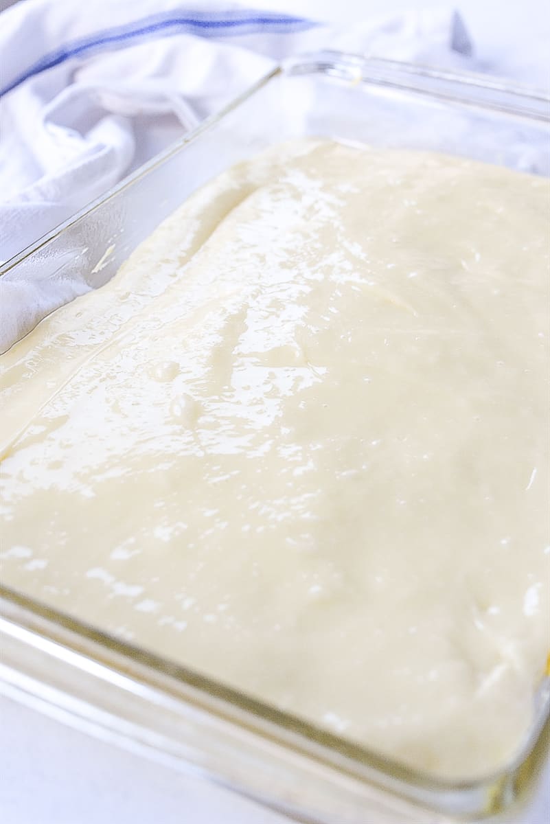 cream cheese layer on ooeyn. gooey cake