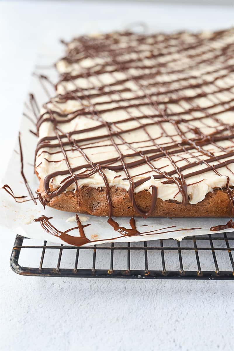 chocolate drizzled over brownies