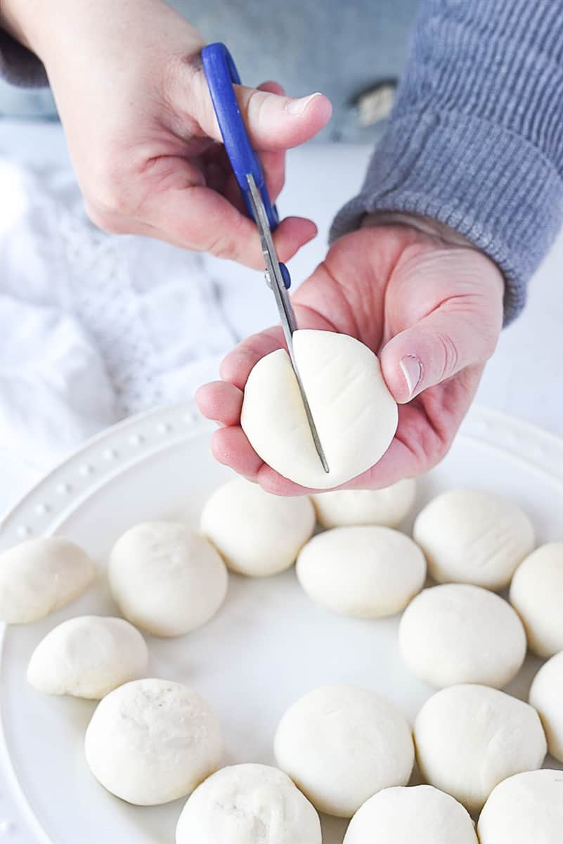 cutting roll dough in half